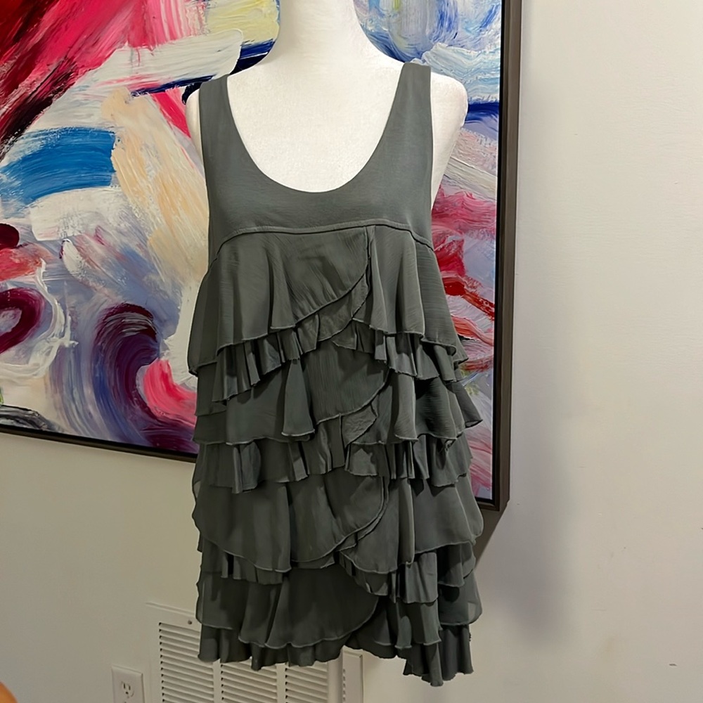 Form fitting pale green/sage tank top with ruffles, size M.